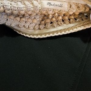 Madewell clutch with bids.